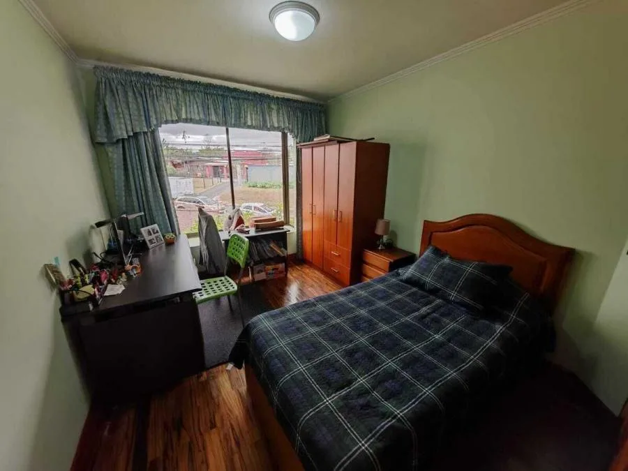 Venta de casa esquinera con uso mixto en El Carmen de Guadalupe US$ 350,000 #9916 - Venta en Goicoechea — photo 5