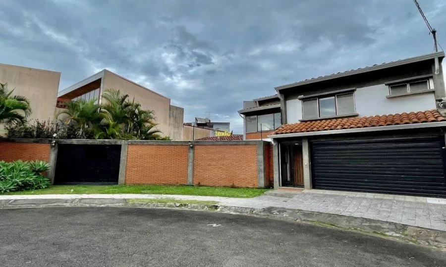 Venta de casa en Residencial Carmiol, Sabanilla $400.000 #RC1564 - Venta en San Pedro