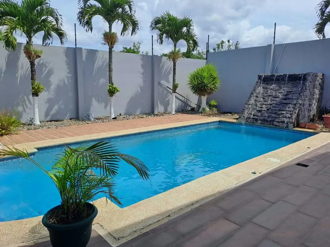 This beautiful house with 4 bedrooms, two floors, swimming pool, and play area is located in Santo Domingo de Heredia, in the District of San Vicente. A very convenient area to get to ... — photo 2