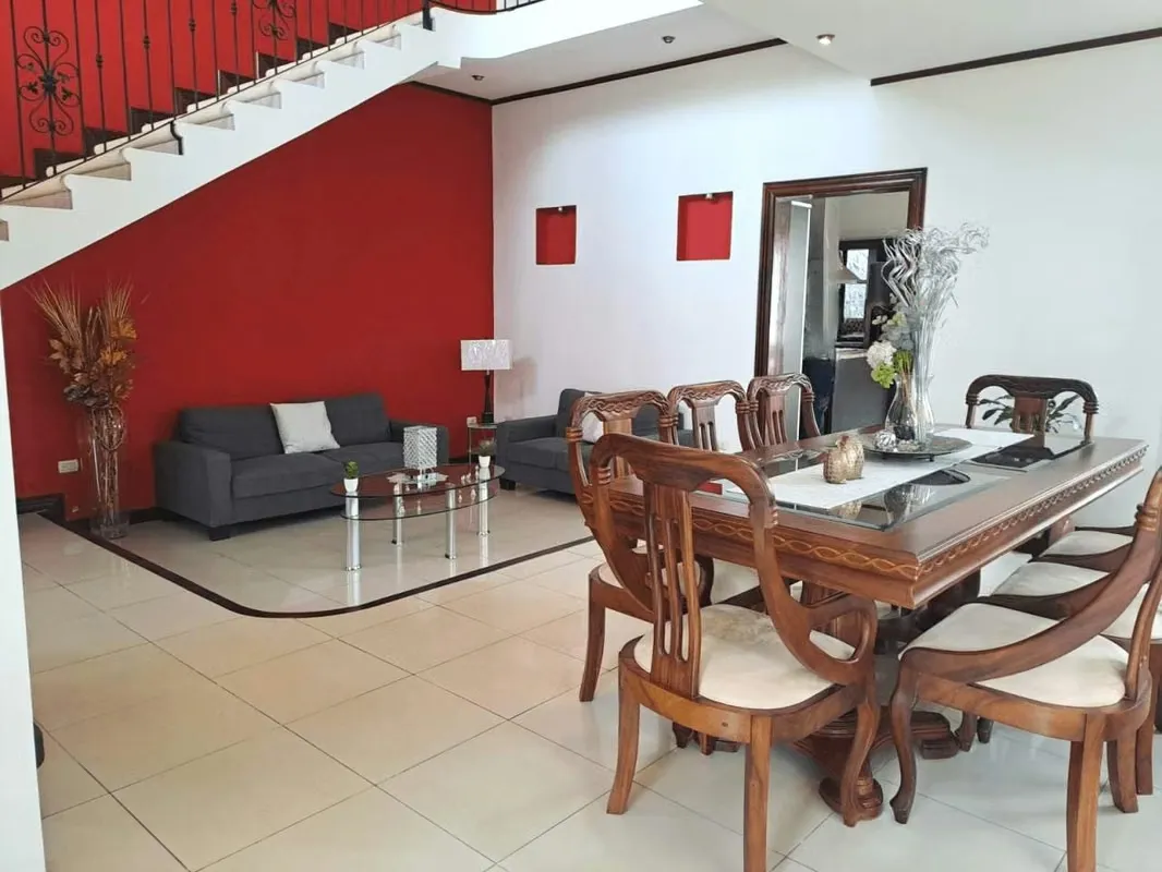 This beautiful house with 4 bedrooms, two floors, swimming pool, and play area is located in Santo Domingo de Heredia, in the District of San Vicente. A very convenient area to get to ... — photo 3