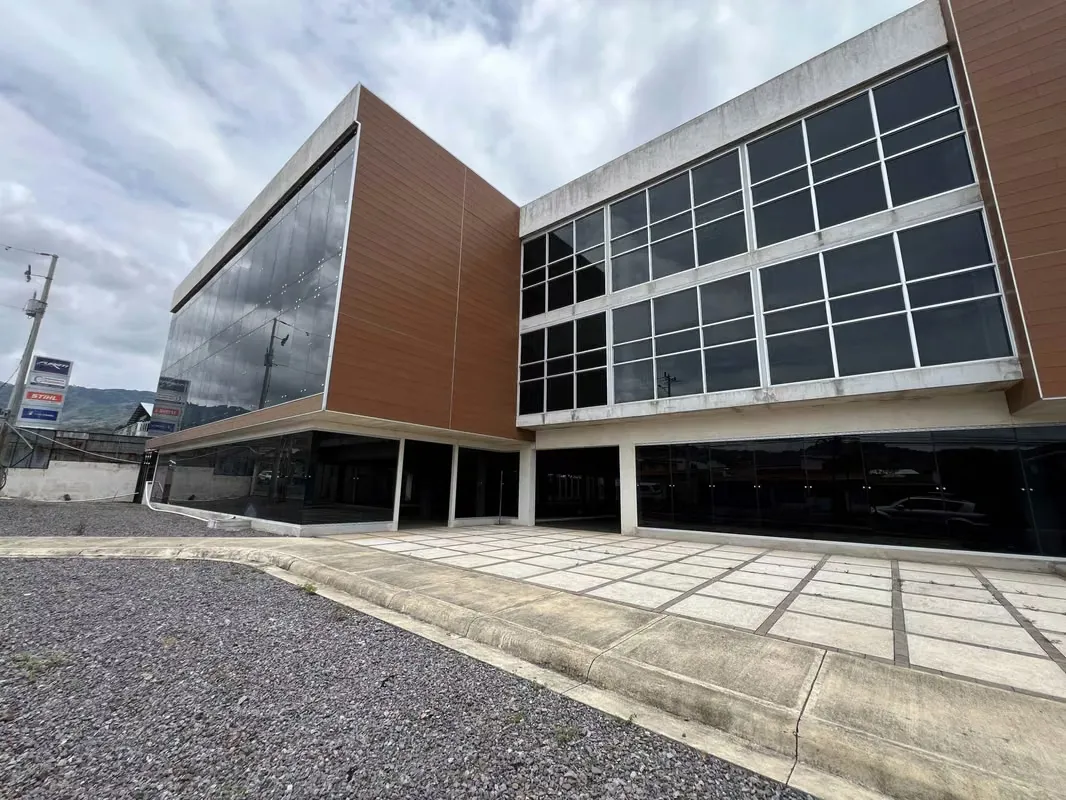 5-level gray building, including basement and rooftop