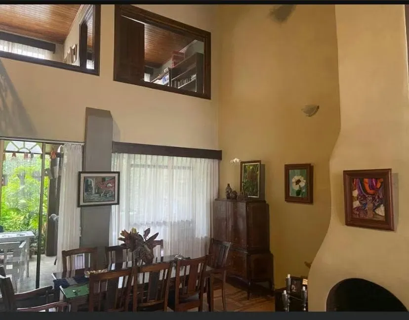 Spacious detached house with gardens for sale