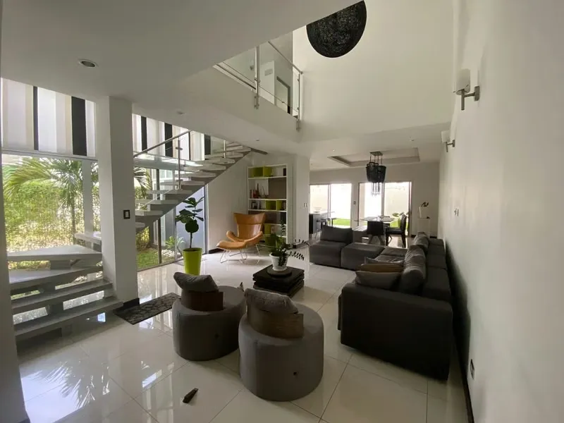 Discover this cozy two-story home located in a secure gated community with 24/7 surveillance, strategically ...