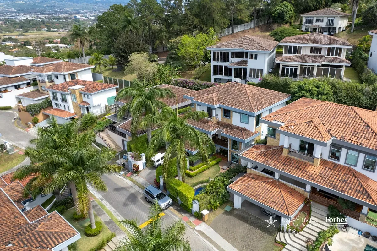 This elegant Spanish Mediterranean-style residence perfectly blends classic architectural charm with a functional layout designed for comfort and ...