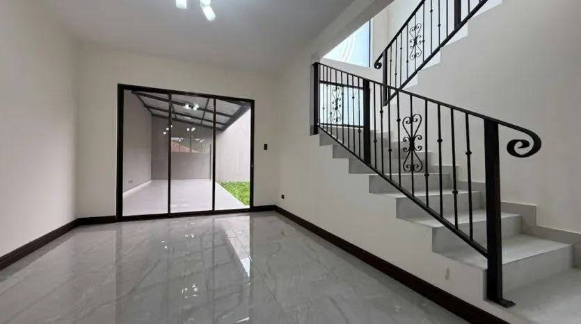 Brand new 2-story modern house, full of natural light, with a patio and green area, offering the peace and security of living in a Condominium.