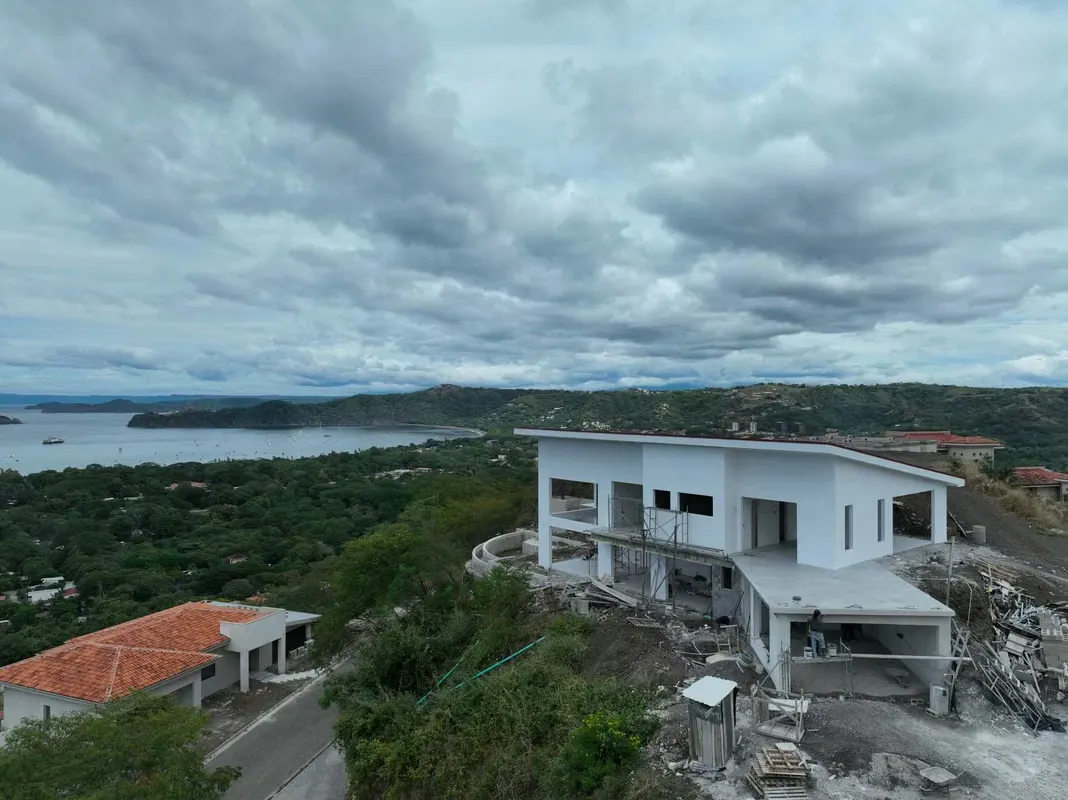 Discover this stunning residence under construction within Coco Bay Estates, Playas del Coco: a modern home with 5 ensuite bedrooms, designed for those seeking spacious ...