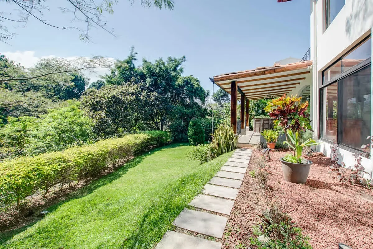 Home for rent Guachipelin Escazu. Being a corner property it has lots privacy and unique nature views to a reserve. Condominium with only 3 houses. ...