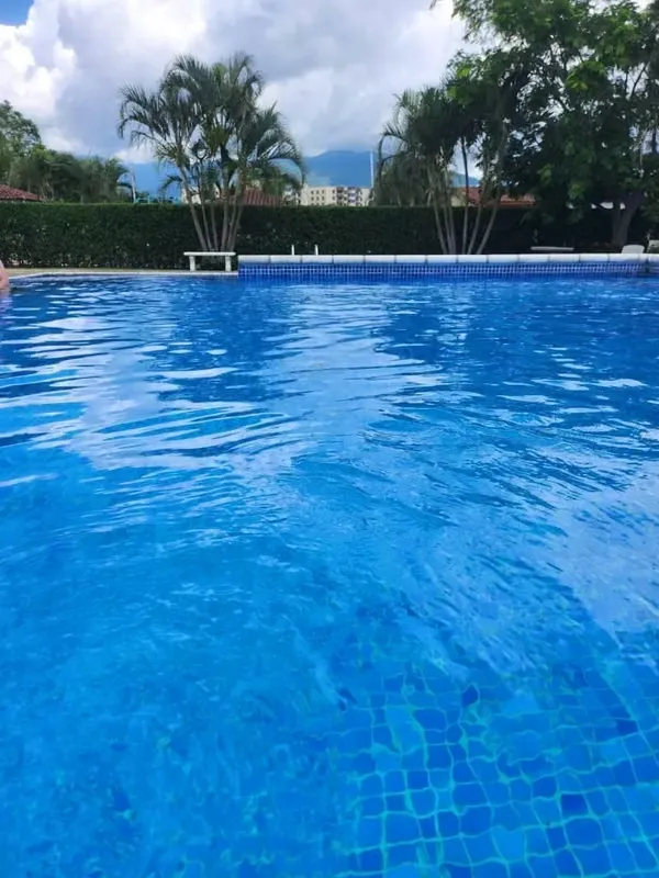 Buy a single-story home in a gated community in San Rafael de Alajuela.