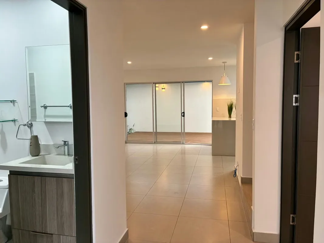 Discover the most versatile and functional property in the exclusive Distrito San Juan Condominium. In a market of similar options, this residence stands out due to an exceptional added ... — photo 4