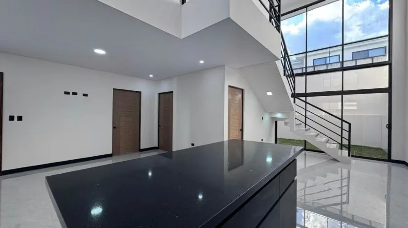 Brand-New Home for Sale in Distrito San Juan Condominium with Exceptional Natural Light — photo 3
