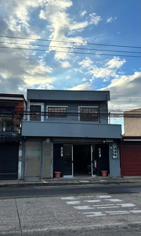 Mixed-use commercial and residential property strategically located on the main road of La Aurora, Heredia. This high-traffic ...