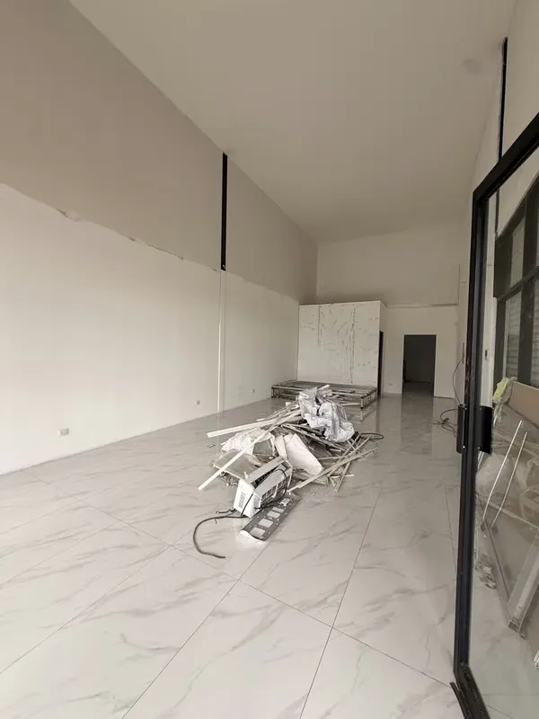 On highly busy street, near educational centres, residential and commercial area