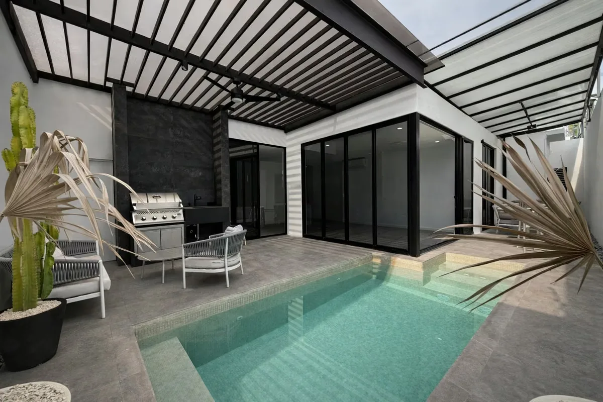Modern single-story home located in one of the most exclusive residential communities in Santa Ana. It features a ...