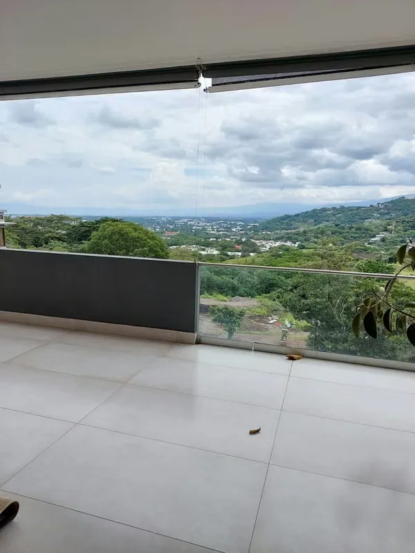 Escazu, modern condo, nice views, broad and moderate social areas.
