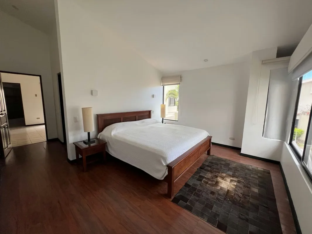 Spacious semi-furnished 3-bedroom house plus maid's quarters for rent in a gated community very close to Escazú Centro!