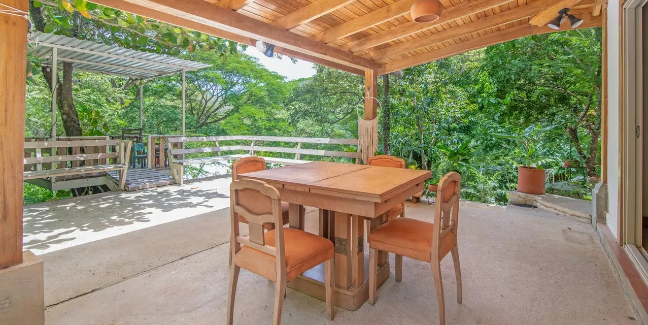 Nestled within the secure, gated community of Highlands Esperanza, this charming family home offers a serene retreat surrounded by nature. Featuring rustic wooden accents and a ... — photo 5