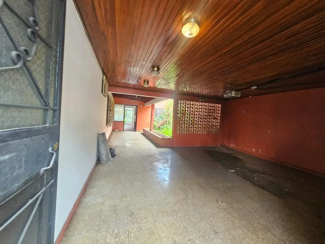 This lot includes a house that is 80% complete and needs to be demolished or remodeled. It has a solid structure. — photo 5