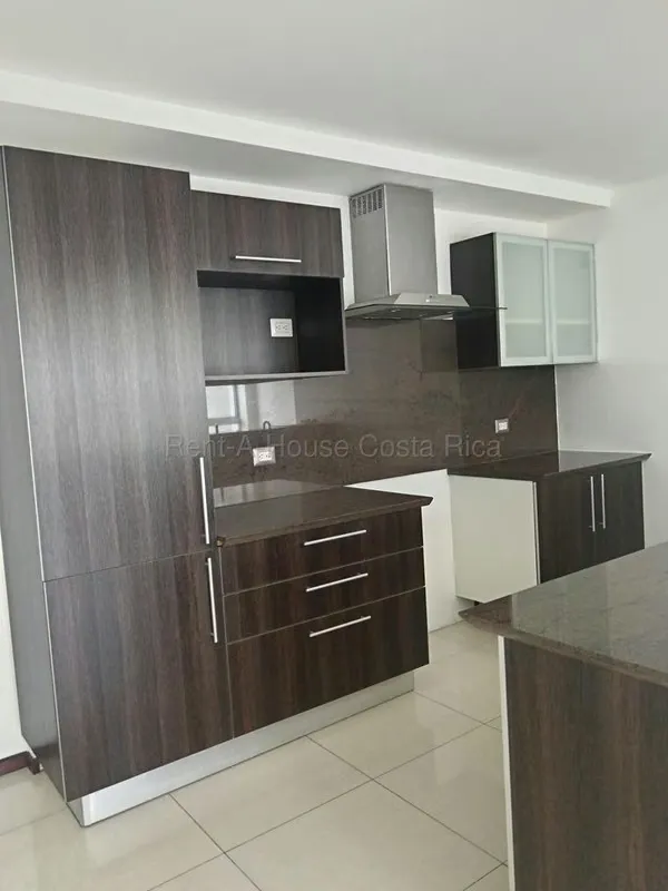 Descubre la combinación perfecta de ubicación estratégica, diseño moderno y comodidad en este exclusivo condominio en La Uruca. ... — photo 4
