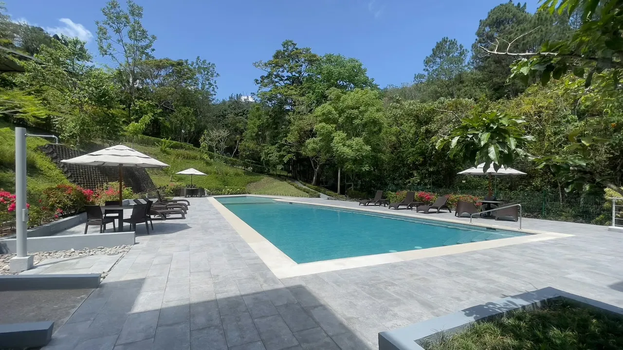 Located within an exceptional eco-urban development, Bosques de Escazú is set on 23,000 square meters of lush mountainous land covered with native vegetation. The community features ...