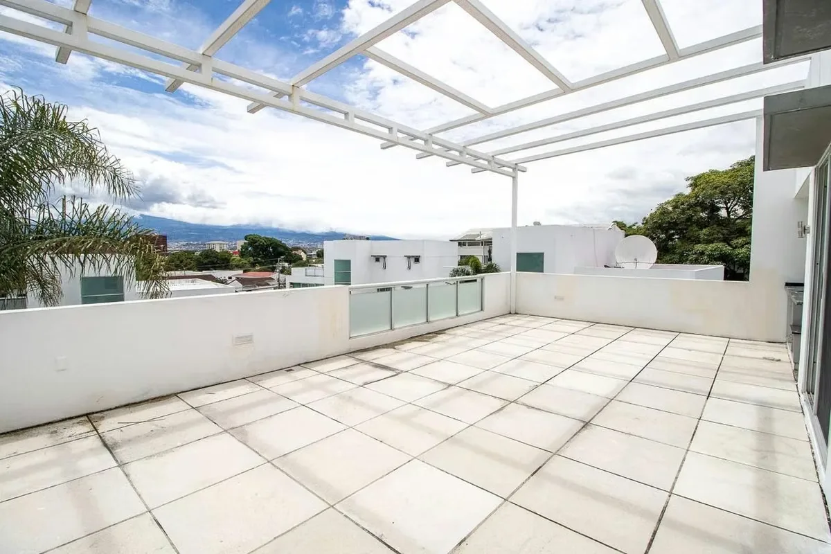 Located in one of the most exclusive and secure condominiums in Escazú, this spectacular three-level corner residence offers an impeccable ... — photo 3