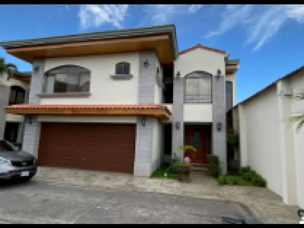 Ubicada en una de las zonas residenciales más exclusivas y cotizadas del este de San José, esta elegante propiedad combina amplitud, confort, privacidad y acabados de alta calidad. ... — photo 2