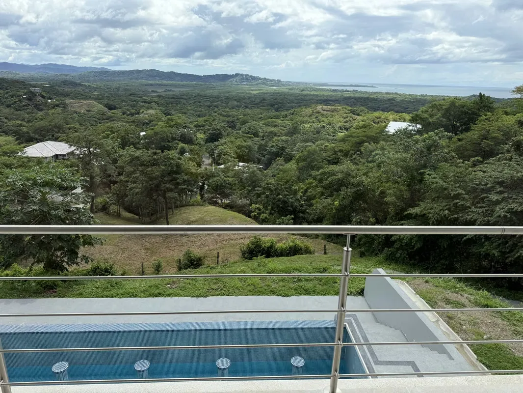 This brand new five bedroom luxury home is located in the sought after Almendro Hills area above Playa Grande. The ...