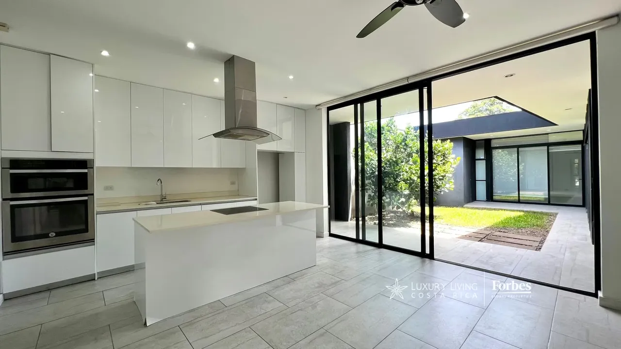 Located within the exclusive Évora Condominium, this single-story home offers a unique living ...