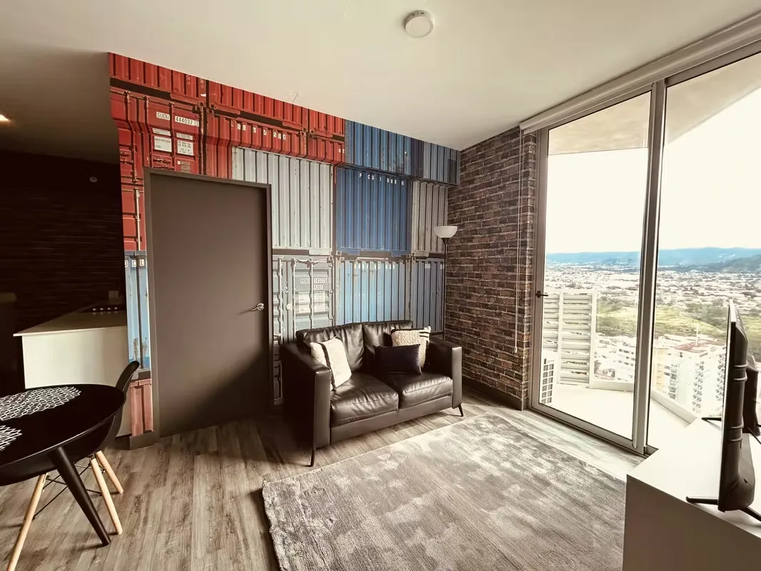 Experience high-rise living and modern design in an exclusive San José condominium. This fully furnished ...