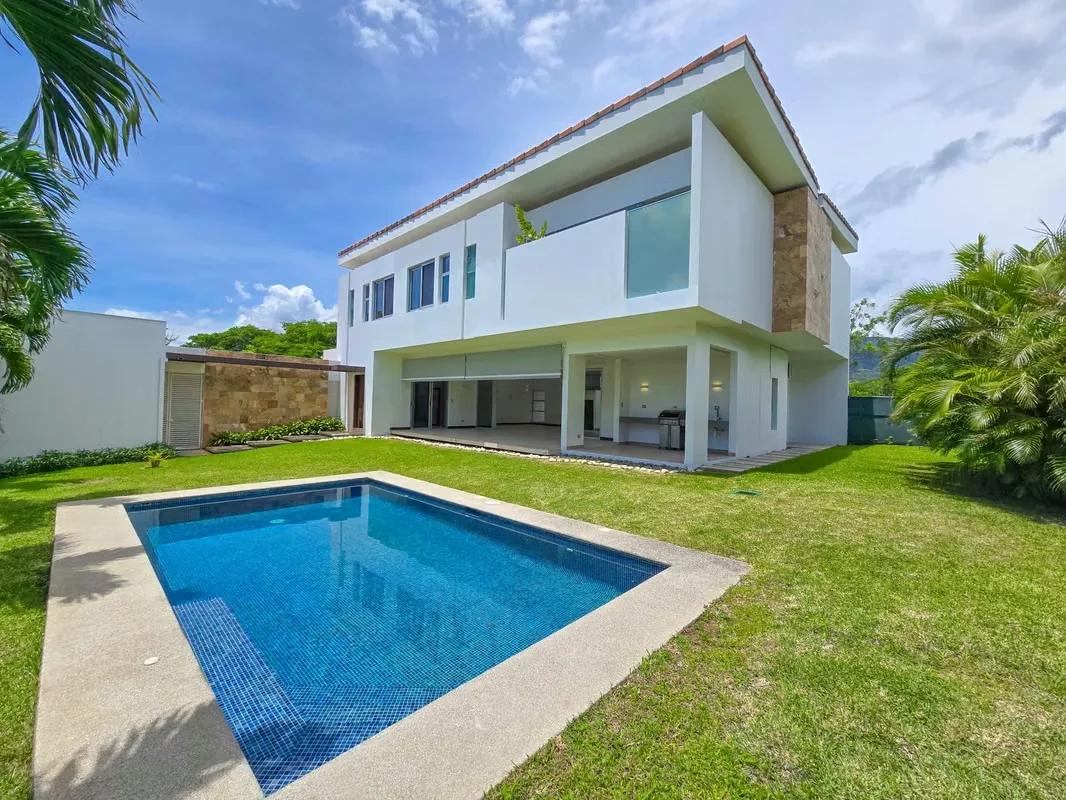 Luxury contemporary corner home for rent or sale located in the exclusive Valle del Sol Golf Community in Lindora, Santa Ana.