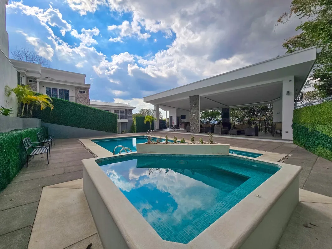 Beautiful corner home located in an exclusive gated community with only 44 residences in Rio Oro, Santa Ana. This modern two-level property offers spacious interiors, high-quality ...