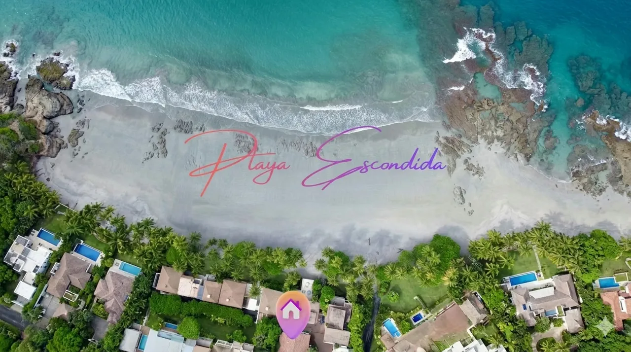 A residence on the exclusive Playa Escondida, completely remodeled with marble floors inside and out, fine woods, Pella brand windows with ...
