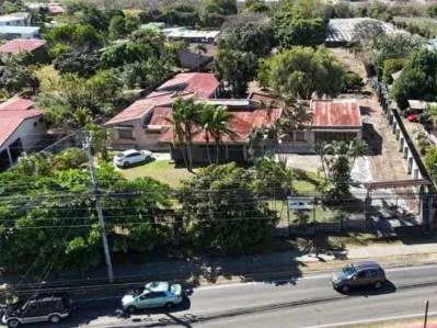 Se vende Espectacular terreno ideal para supermercado ó bodegas, en San Joaquín de Flores, Llorente