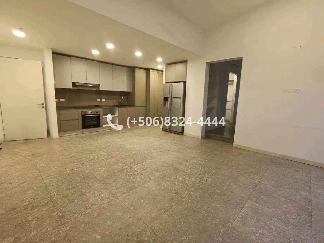 At the entrance to the apartment integrated social space kitchen, living room and dining room.