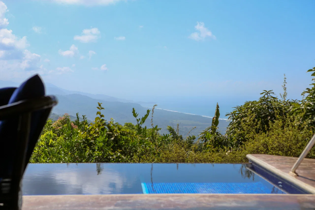 Majestic Ocean View Home With Solar & Mature Exotic Fruit Trees – 2.4 Acres