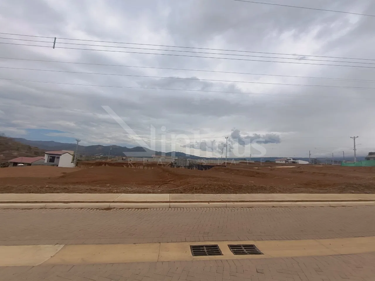Venta de lote en condominio con amenidades en Grecia