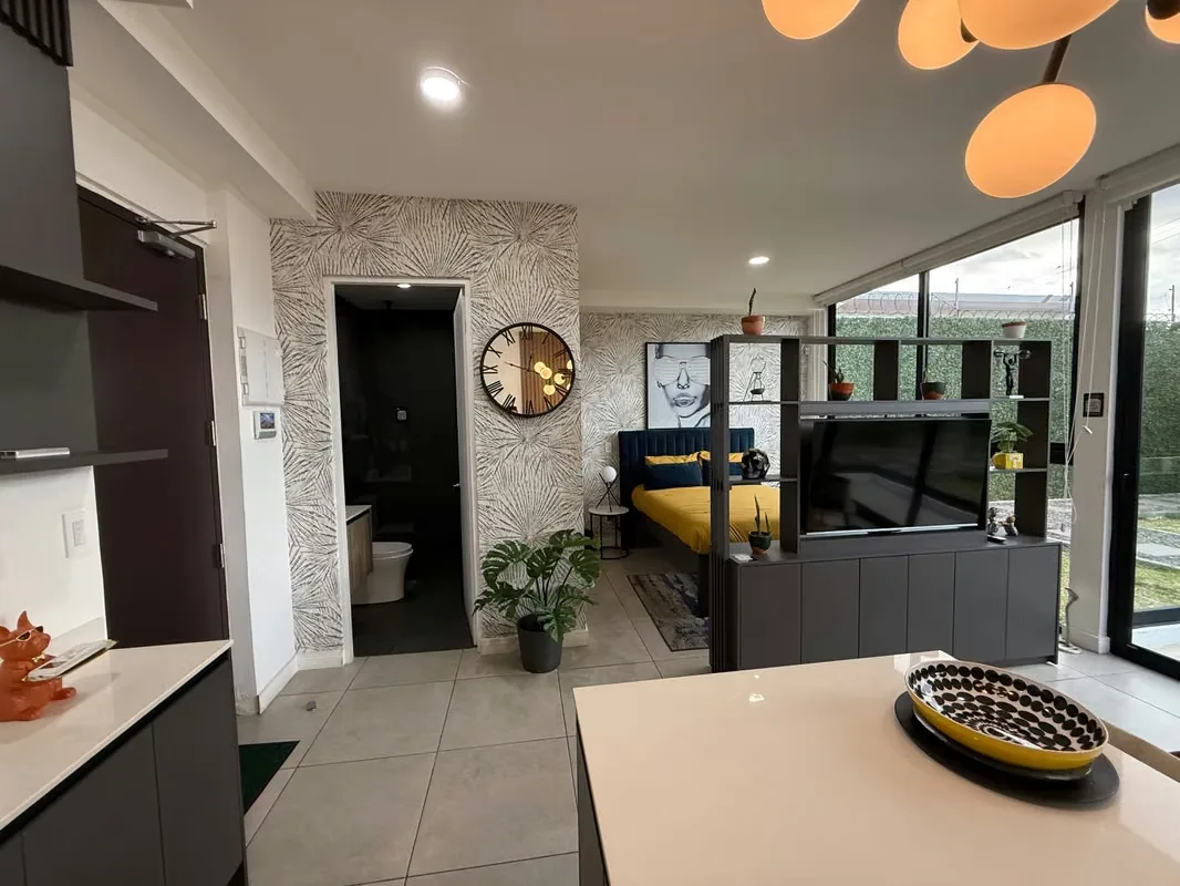 Un espacio práctico con distribución abierta que integra cocina, sala y área de descanso. Una opción para ..., photo 5