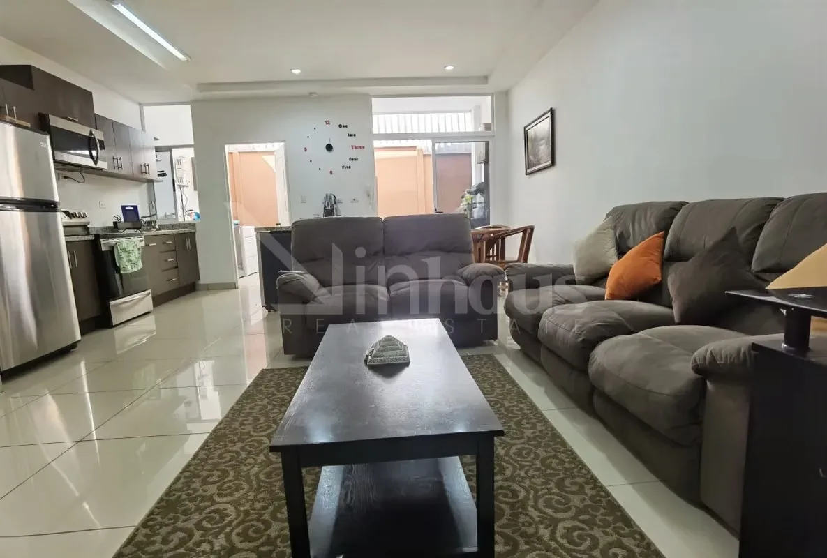 The ground floor includes a half-bathroom for visitors, an open living room and kitchen, as well as a back garden and separate battery area. This structure of 165 square meters of ..., photo 5