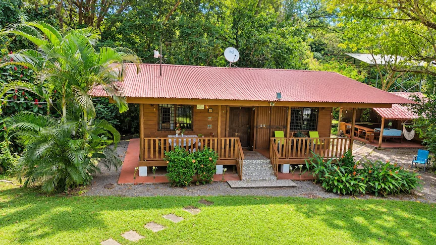 WOODEN CABIN WITH A NEARBY RIVER AND TROPICAL NATURE, IN UVITA