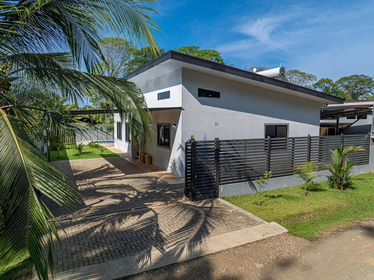 CASA SERENITY: ELEGANT TROPICAL RETREAT STEPS FROM UVITA BEACH, IN BAHIA BALLENA – 0.12 ACRES, photo 3