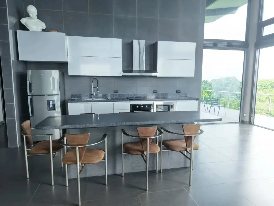 Located 500 meters above sea level in the exclusive Hermosa Hills of Jacó, this stunning 5-bedroom property offers unparalleled luxury and breathtaking mountain views. Built in 2021, ..., photo 10