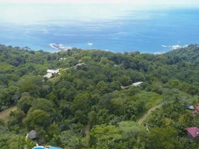 Terreno con vistas a la puesta de sol sobre el océano en Playa Dominical.