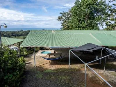 Lote de fácil acceso con vista al mar en Uvita con Casita, Rancho y piscina ya construidos., photo 5