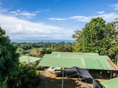 Lote de fácil acceso con vista al mar en Uvita con Casita, Rancho y piscina ya construidos., photo 7