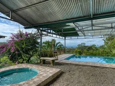 Lote de fácil acceso con vista al mar en Uvita con Casita, Rancho y piscina ya construidos., photo 9