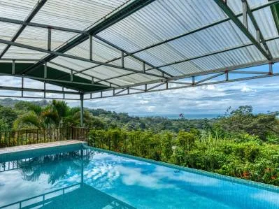 Lote de fácil acceso con vista al mar en Uvita con Casita, Rancho y piscina ya construidos., photo 10