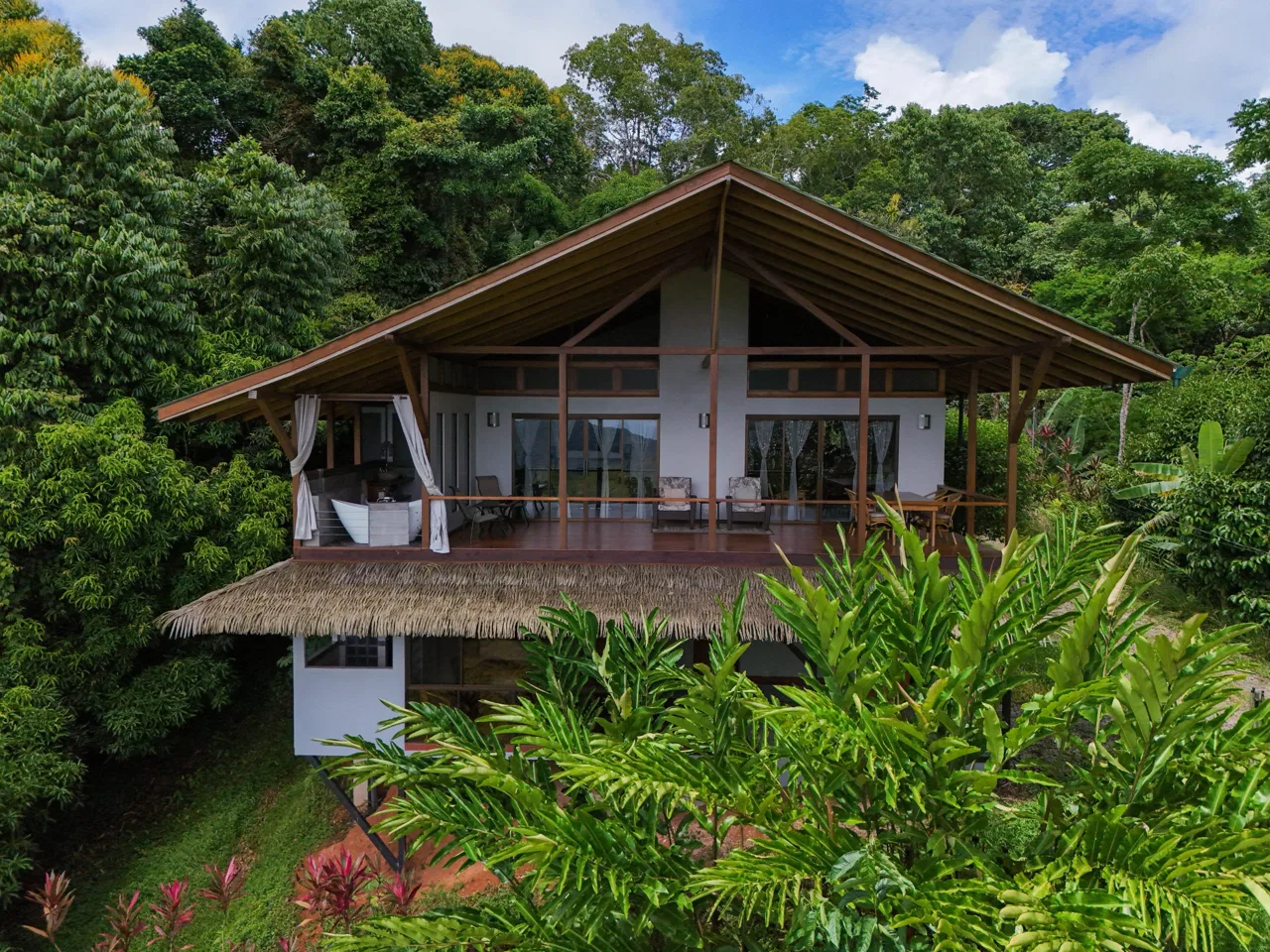 TROPICAL RETREAT IN PLATANILLO – OCEAN VIEW HOME PLUS APARTMENT IN ESTABLISHED COMMUNITY – 0.88 ACRES