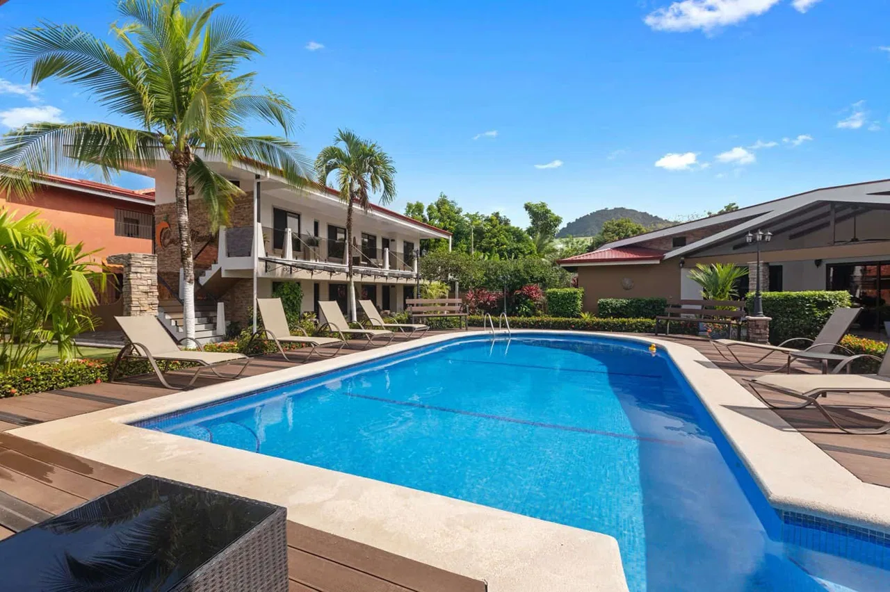 Large complex in the heart of Jaco with a large oversized pool and outdoor garden and bbq area. | Costa Rica Real Estate | Jaco Realty
