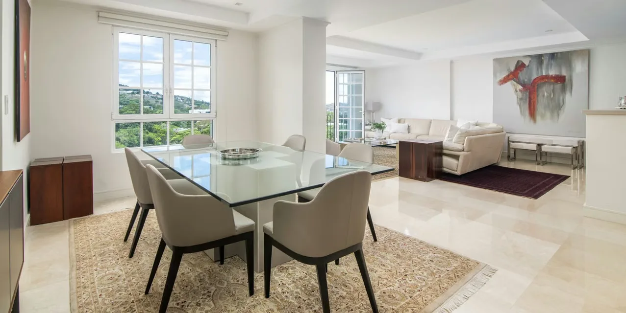 2-bedroom apartment in Escazú El Cortijo with mountain views, marble floors, central air, and parking. Spacious living area with modern finishes. Costa Rica.
