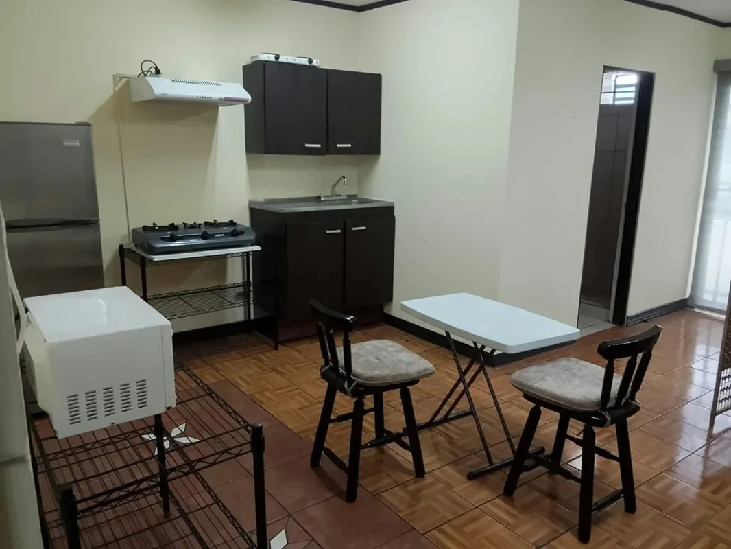 (single bed private bathroom kitchen furniture template two burners microwave refrigerator dining table closet.) Lavanderia area equipped Washing and Dryer. Consumption of Services ...
