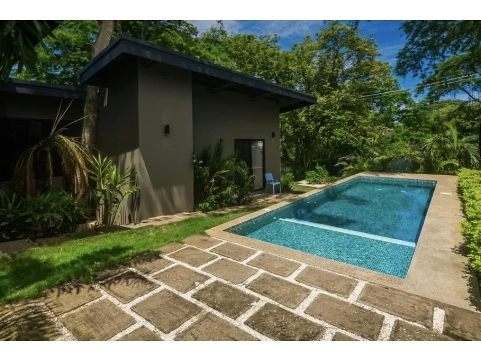 Discover the perfect balance between modern design, tropical comfort, and prime location in this stunning 3-bedroom, 3.5-bathroom home located in the exclusive Tamarindo Park community, ..., photo 2